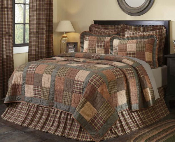Crosswoods Combos, russet, green, and tan plaid fabrics, Ninepatch blocks accented with sashing in dark olive green floral ditsy print fabric. Primitive Country Farmhouse Bedding Home Decor.