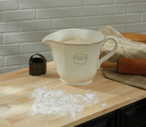 Made from high fired dolomite, the Villager ceramic dishware collection with debossed pencil sketched kitchen icons features a cream back ground and brushed edges.