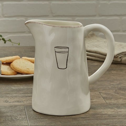 Made from high fired dolomite, the Villager ceramic dishware collection with debossed pencil sketched kitchen icons features a cream back ground and brushed edg