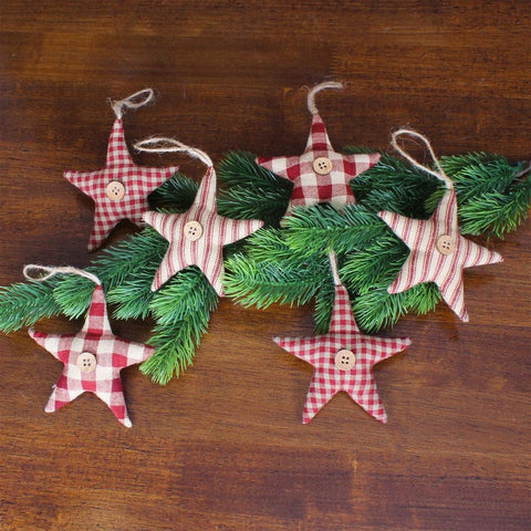 Set of six primitive fabric star ornaments in burgundy tan and mustard plaid and striped patterns