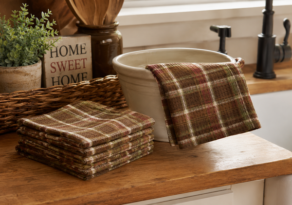 Sussex plaid waffle-weave dishcloth featuring barn red, brown, cream, and subtle sage accents in a classic primitive country plaid pattern.