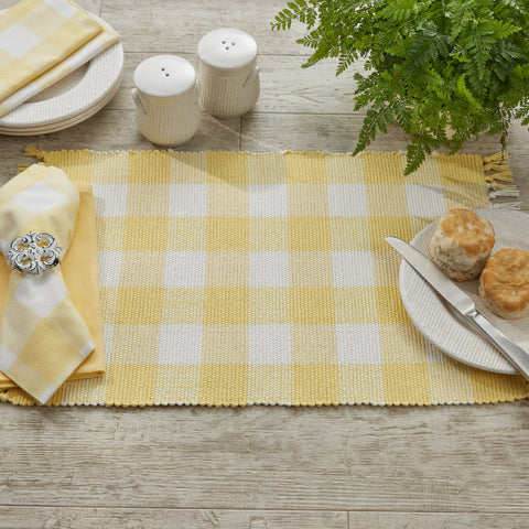 Wicklow Placemat Yarn (set of 4) - Yellow  Create an enticing dining experience with our Wicklow placemat set. This set features a bold buffalo print, tinted in a beautiful yellow and cream hue. 