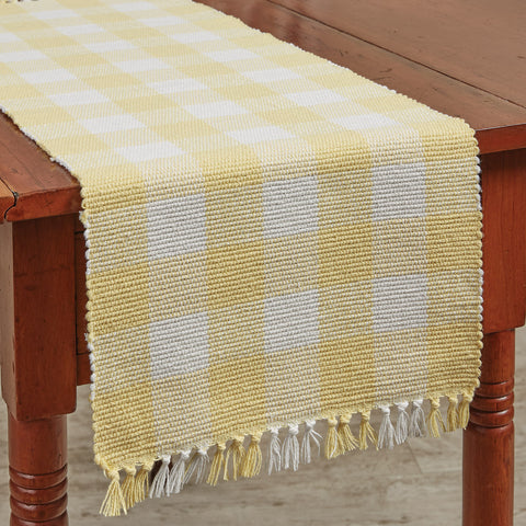 Add a fresh look to your country decor with the Wicklow Check Yellow Table Runner! The colors of lemon yellow and candlelight white combine to create a bright and cheery check! 