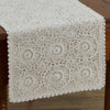 Cream lace 13x36 table runner with intricate crochet pattern and scalloped edges displayed on a rustic wood dining table