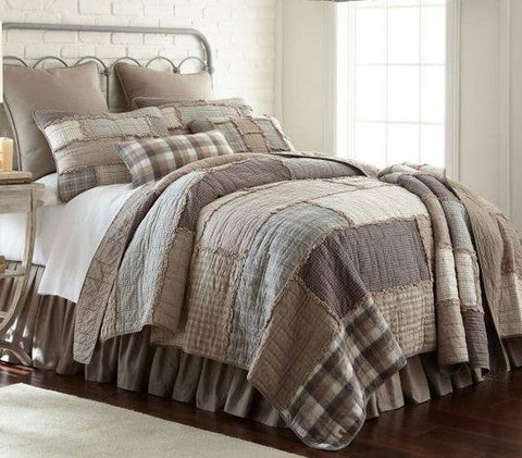 This stylish quilted bedding collection was inspired by donna sharp’s best-selling campfire and woodland quilts. a series of soft, woven plaids in fresh neutral colors such as taupe, ivory, slate and dove grey help to make this an instant classic. the fabrics are arranged in large offset panels with geometric quilting for a contemporary touch.