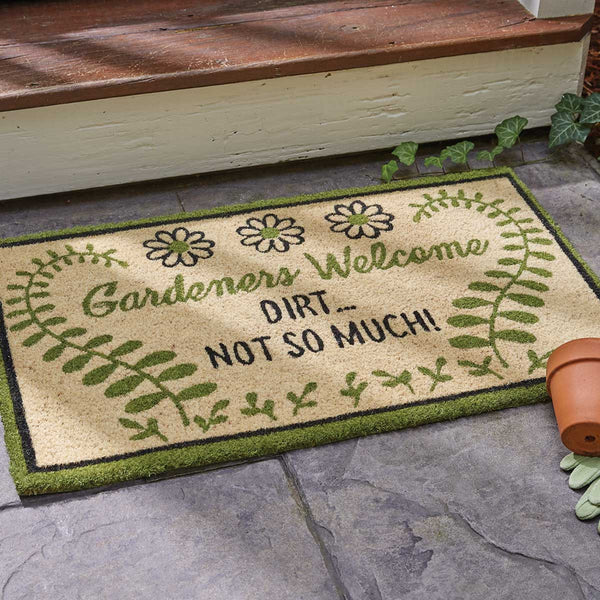 Our Gardeners Welcome Doormat will be a wonderful addition to your entryway. Features flowers and leaves with the message Gardeners Welcome Dirt... Not So Much!