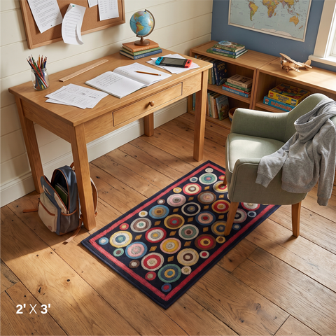 Coin Multicolor Primitive Wool Felt Accent Rug 2x3 with colorful hand-stitched circles on a black background