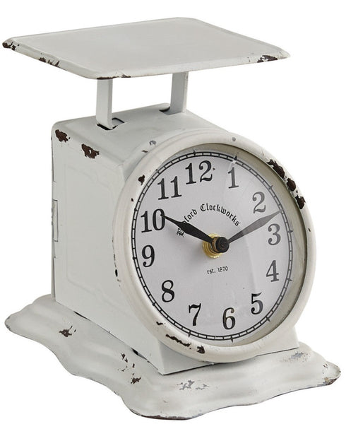 Liberty Postage Scale Clock  Dimensions: 4.25" W x 5.75"H x 6"D Authentic replica of an old postage scale White