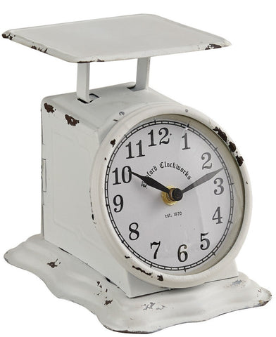 Liberty Postage Scale Clock  Dimensions: 4.25" W x 5.75"H x 6"D Authentic replica of an old postage scale White
