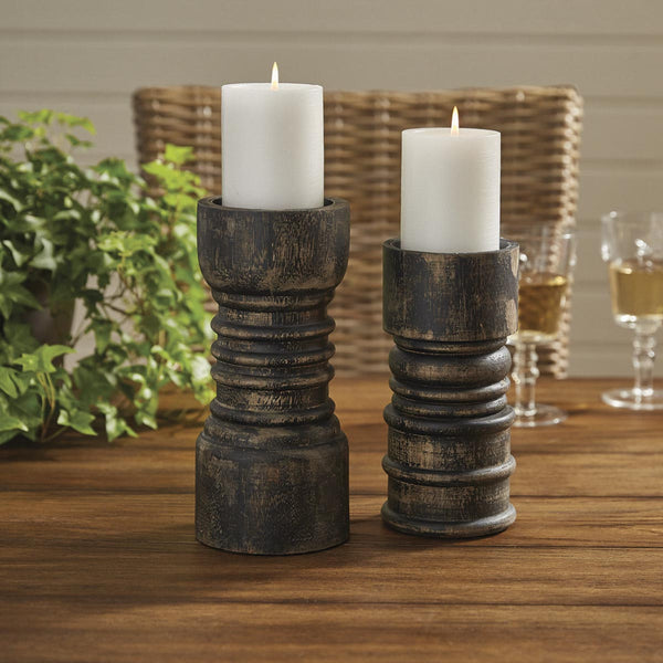 The black distressed finish on the Rustic Candlestick by Park Designs make it perfect for a country lodge or farmhouse setting. Available in a tall size also (as pictured/sold separately).