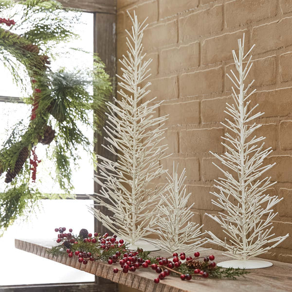 White Metal Trees - Large, accent your Christmas decor with the beautiful Large White Metal Tree! Perfect way to fill in that empty spot.  An instant touch of festive style! Also available in small and medium sizes (as pictured / sold separately).  1 Large Tree Dimensions: 21.5" H x 7" Diameter