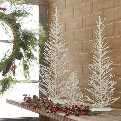 White Metal Trees - Large, accent your Christmas decor with the beautiful Large White Metal Tree! Perfect way to fill in that empty spot.  An instant touch of festive style! Also available in small and medium sizes (as pictured / sold separately).  1 Large Tree Dimensions: 21.5" H x 7" Diameter