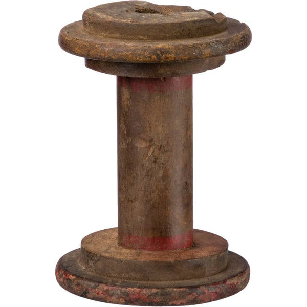 Large Wooden Spool  This antique wooden spool features natural wood with distressed details for a naturally rustic style. Each piece is unique with varying details like color, pattern, style, and size.&nbsp;  Measures approximately 4.5" x 6"L