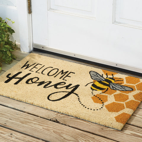 Our Welcome Honey Doormat will be a wonderful addition to your entryway. It features honeycomb and a honey bee with the message Welcome Honey.