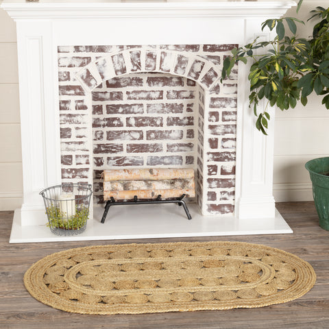 Create a warm, homey feeling with natural tones in pure Jute that add style anywhere a small accent rug is needed. The Celeste Jute Rug measures 27x48 inches and features a classic oval shape and tight braids constructed with 100% Jute. Features alternating rows of solid braids and small jute circles for a natural, rustic look that complements a wide array of farmhouse decor with rich texture and classic country char