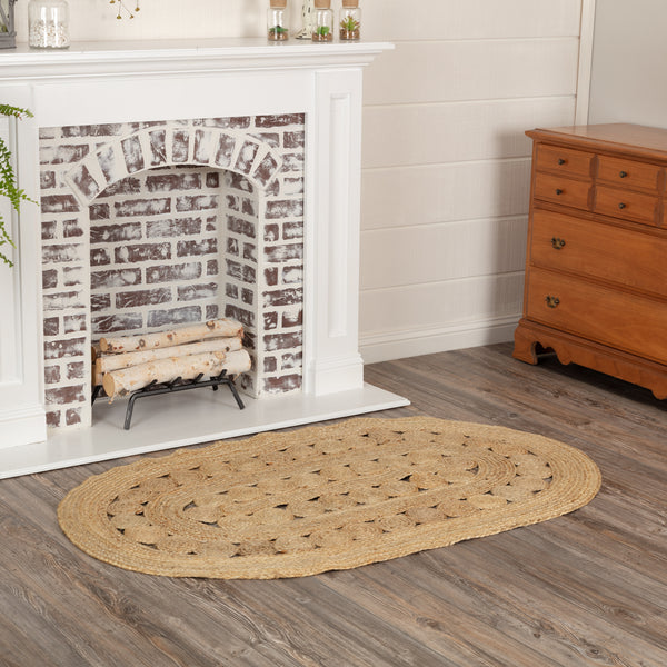 Create a warm, homey feeling with natural tones in pure Jute that add style anywhere a mid-size accent rug is needed. The Celeste Jute Rug measures 36x60 inches and features a classic oval shape and tight braids constructed with 100% Jute. Features alternating rows of solid braids and small jute circles for a natural, rustic look that complements a wide array of farmhouse decor with rich texture and classic country charm. 