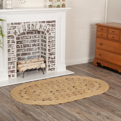 Create a warm, homey feeling with natural tones in pure Jute that add style anywhere a mid-size accent rug is needed. The Celeste Jute Rug measures 36x60 inches and features a classic oval shape and tight braids constructed with 100% Jute. Features alternating rows of solid braids and small jute circles for a natural, rustic look that complements a wide array of farmhouse decor with rich texture and classic country charm. 
