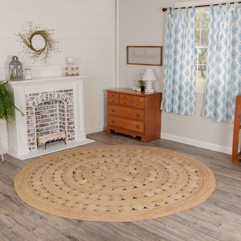 Create a warm, homey feeling with natural tones in pure Jute that add style anywhere a mid-size accent rug is needed. The Celeste Jute Rug features a 8 foot diameter and a classic circular shape with tight braids constructed from 100% Jute. Features alternating rows of solid braids and small jute circles for a natural, rustic look that complements a wide array of farmhouse decor with rich texture and classic country charm. Reversible design features the same design on the front and back.