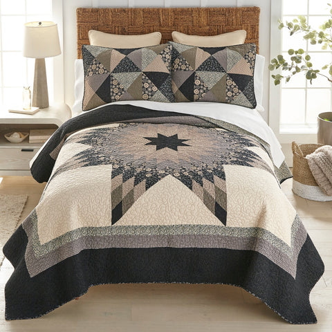 Elevate your bedroom with the Donna Sharp Lexington Star Quilt Collection. Oversized starburst design, earthy neutrals & timeless cotton patchwork charm.