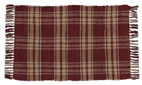 Primitive Sturbridge Wine Rag Rug 24x42 in wine & tan plaid. 100% cotton, reversible, with fringe. Perfect farmhouse accent for entryway or kitchen.