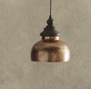 Antique copper pendant light with hammered metal finish and dark top for rustic farmhouse lighting