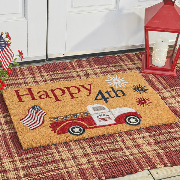 Our Star Spangled Truck Doormat will liven up your entryway and add an exciting welcome to your home.  Featuring a vintage truck with fireworks, and an American Flag hanging off the back.