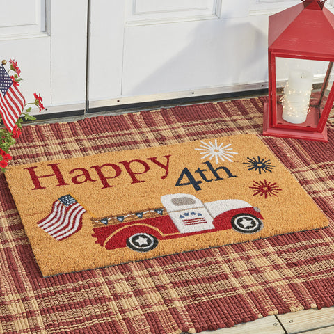 Our Star Spangled Truck Doormat will liven up your entryway and add an exciting welcome to your home.  Featuring a vintage truck with fireworks, and an American Flag hanging off the back.