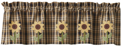 The beautiful rich colors of a sunflower in full bloom will adorn your windows with the Sunflower In Bloom Applique Valance. You can't go wrong with this plaid color combination of black, buttercream and antique white and the standout extra feature of the applique sunflowers. Beautiful!