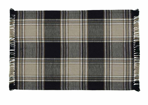The deep black and sand brown large plaid fabric of the Soapstone Placemats by will give your table that country farmhouse appeal in colors of Black, Sand and White! Check out the matching table runner, napkins, table topper, dishcloths, hand towels, shower curtain and window treatments (sold separately).  Colors: Black, Sand & White