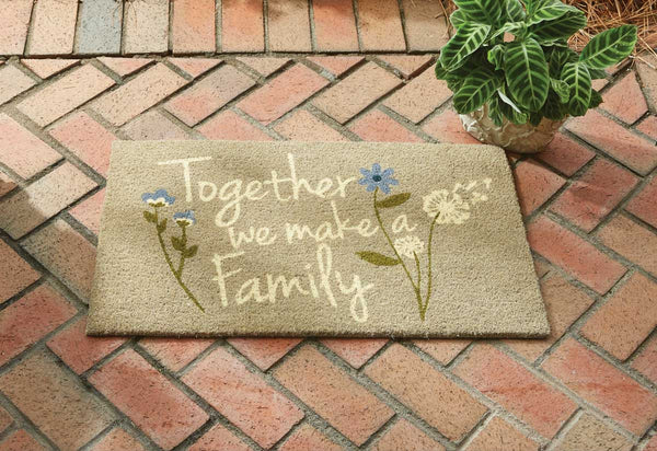 Our Together We Make Doormat will liven up your entryway and add warm welcome to your home.  Features blue and white flowers with the words Together We Make a Family.  Made from all-natural fibers and hand painted sentiment in colorfast dyes, this doormat is durable and skid resistant. It will be the perfect addition to your decor that can be used all year.  Measures 18" X 30" Made from natural fibers, hand printed with colorfast non-toxic dyes Durable, mildew and skid resistant