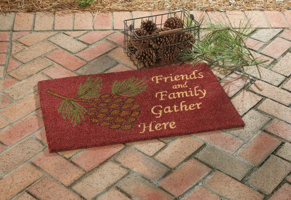 Add charming style to your floor with the Pinecone Doormat! Featuring a pinecone design in green and brown tones on red with a message in cream, Family and Friends Gather Here. This doormat will be an elegant touch to your country decor!   Made from natural fibers, hand printed with colorfast non-toxic dyes. Durable, mildew and skid resistant.