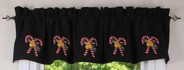 Black Christmas window valance featuring embroidered candy cane and gingerbread appliqué accents.