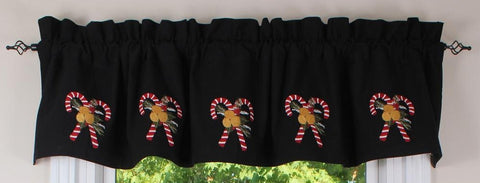 Black Christmas window valance featuring embroidered candy cane and gingerbread appliqué accents.