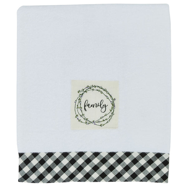 Bouquet Of Grace Terry Bath Towel features a soft, neutral white color that is accented by a black & white checked border. The wording "family" with the circle of flowers gives it added style & grace!