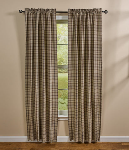 Plains Plaid lined curtain panels in neutral tan and brown plaid fabric hanging on a farmhouse window