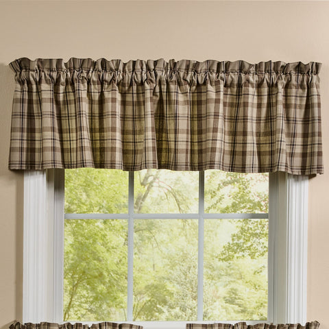 Plains Plaid valance with neutral tan and brown plaid fabric hanging over a farmhouse window