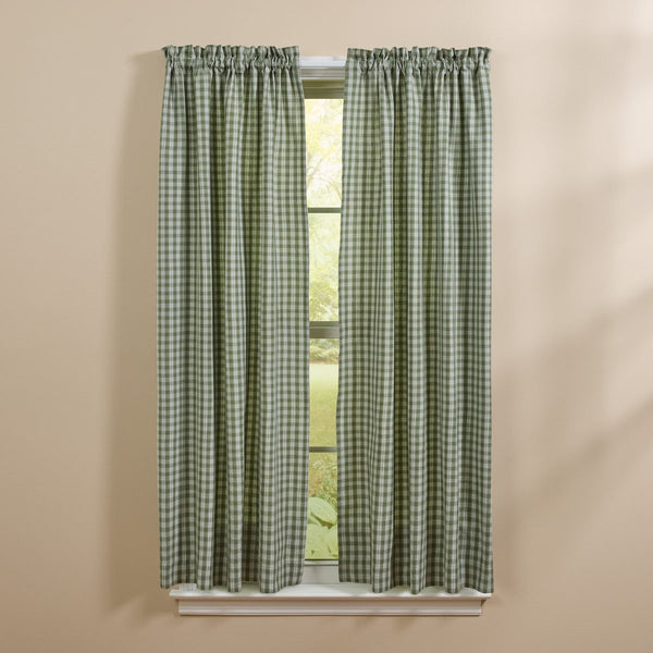 Stafford Ivy green and ivory plaid country curtain panels hanging in a farmhouse window. Sturbridge Plaid Green