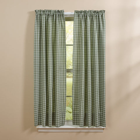 Stafford Ivy green and ivory plaid country curtain panels hanging in a farmhouse window. Sturbridge Plaid Green