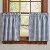Primitive blue and cream plaid Stafford farmhouse tier curtains displayed on a country style window.