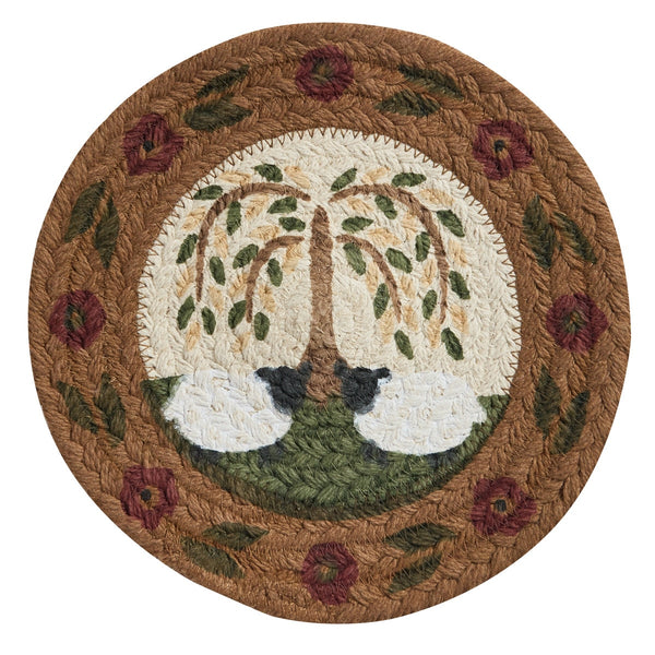 8-inch braided trivet with primitive willow tree and sheep design, floral border, in warm country colors
