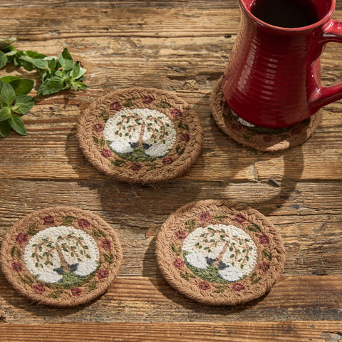 Set of 4 round braided coasters with primitive willow tree and sheep design in warm country colors