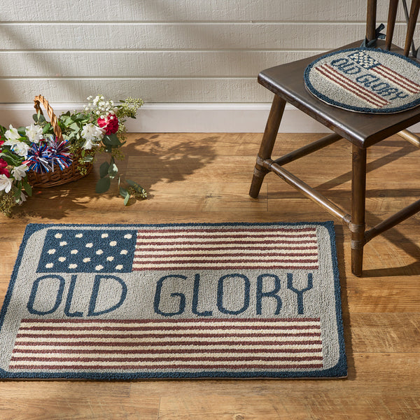 Old Glory Hooked Rug 2' X 3'! Mimicking Old Glory herself, it epitomizes the American flag in all her glory! Enhance your room with the beloved red, white & blue...not just on July 4th, but all year long!  Specifications  Colors: Grey, Darkest Navy, Patriotic Red & White Dimensions: 2' x 3'
