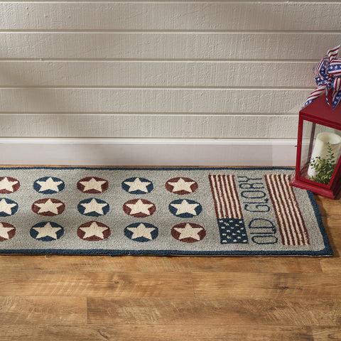 Old Glory Hooked Rug Runner 2' X 6'! Colors are red, white, and blue featuring 15 stars in the middle and American flags on each end with the words "Old Glory". Enhance your room with the beloved red, white & blue...not just on July 4th, but all year long!  DIMENSIONS: 2' X 6'