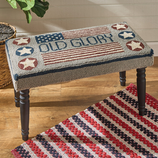 Old Glory Hooked Bench! Mimicking Old Glory herself, it epitomizes the American flag in all her glory! Enhance your room with the beloved red, white & blue...not just on July 4th, but all year long!  Specifications  Colors: Grey, Navy, Red & White DIMENSIONS: 16"H X 32"W X 16"Depth