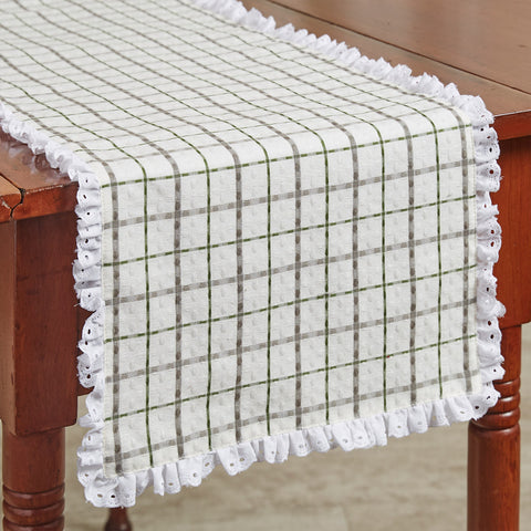The windowpane plaid and beautiful eyelet trim in these<span>&nbsp;</span><strong>Kindred Table Runners</strong><span> </span>are sure to project a classic country farmhouse flair, with the lovely shades of candlelight white, dove gray, and briarwood green! So simple, and yet so elegant! The runners are available in three different sizes.
