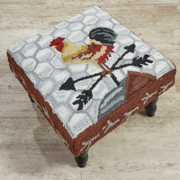 This stunning Break Of Day Rooster Hooked Stool is truly a work of art! The beautiful piece features an intricate rooster perched on a weather vane and pops of color that will liven up any room!