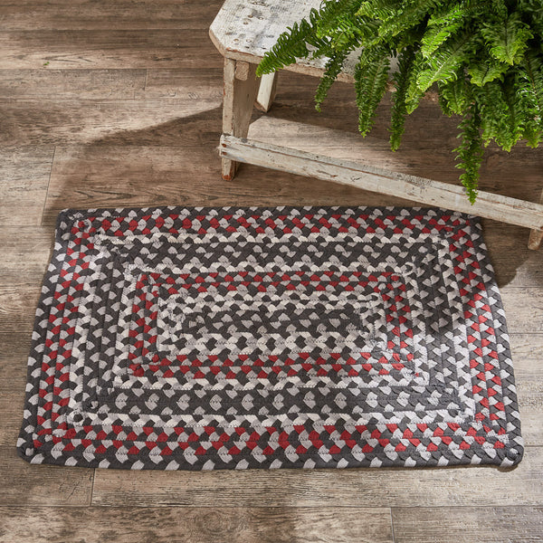 The Limestone Rectangle Braided Rugs feature a vibrant combination of whisper greige, candlelight white, black, and Christmas red! Keep your floors and your feet clean and protected! Available in a variety of size choices.