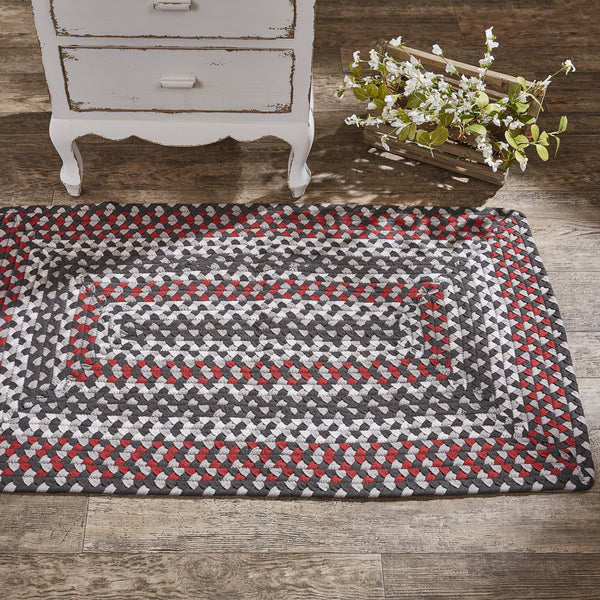 The Limestone Rectangle Braided Rugs feature a vibrant combination of whisper greige, candlelight white, black, and Christmas red! Keep your floors and your feet clean and protected! Available in a variety of size choices. 