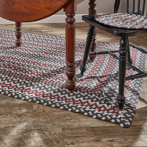 The Limestone Rectangle Braided Rugs feature a vibrant combination of whisper greige, candlelight white, black, and Christmas red! Keep your floors and your feet clean and protected! Available in a variety of size choices.