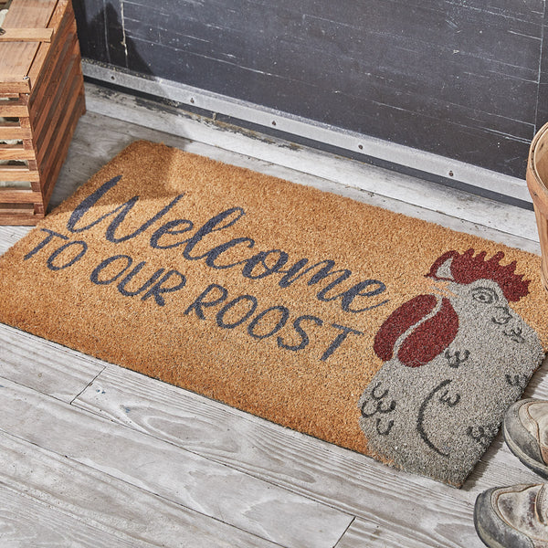 Our Welcome To Our Roost Doormat will liven up your entryway and add warm welcome to your home.  Features a large rooster with the words Welcome To Our Roost.